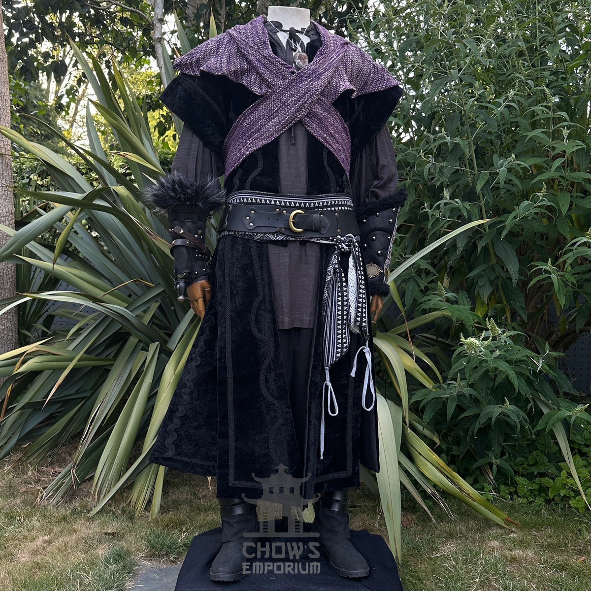 LARP medieval outfit in black and purple with waistcoat, hood, and sash.