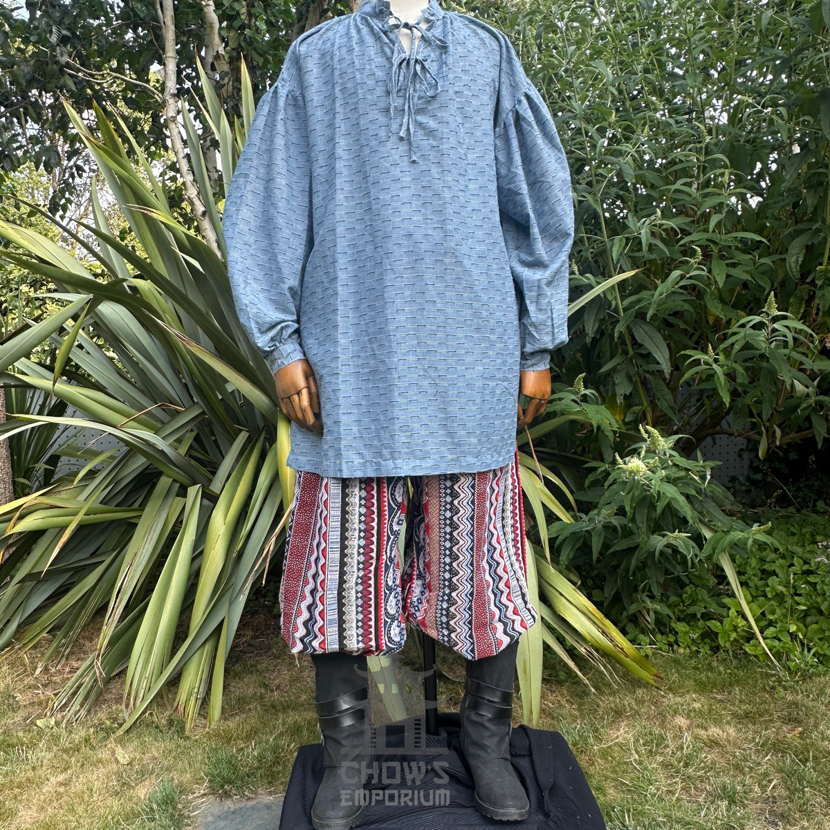 Blue medieval shirt, red zigzag pants, and sash for LARP.