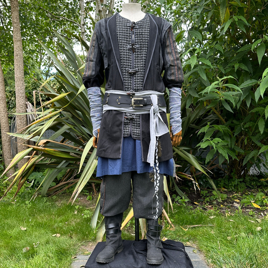 Medieval LARP druid set on outdoor mannequin with layered tunic and sash.