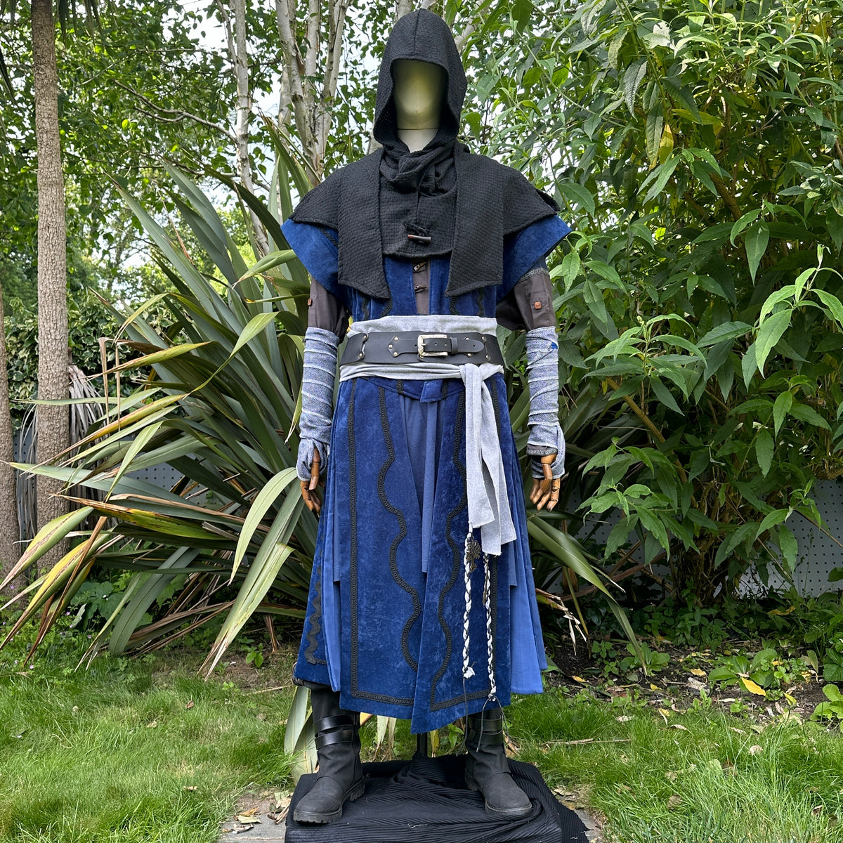 Medieval LARP costume with black hood and blue tunic, front.