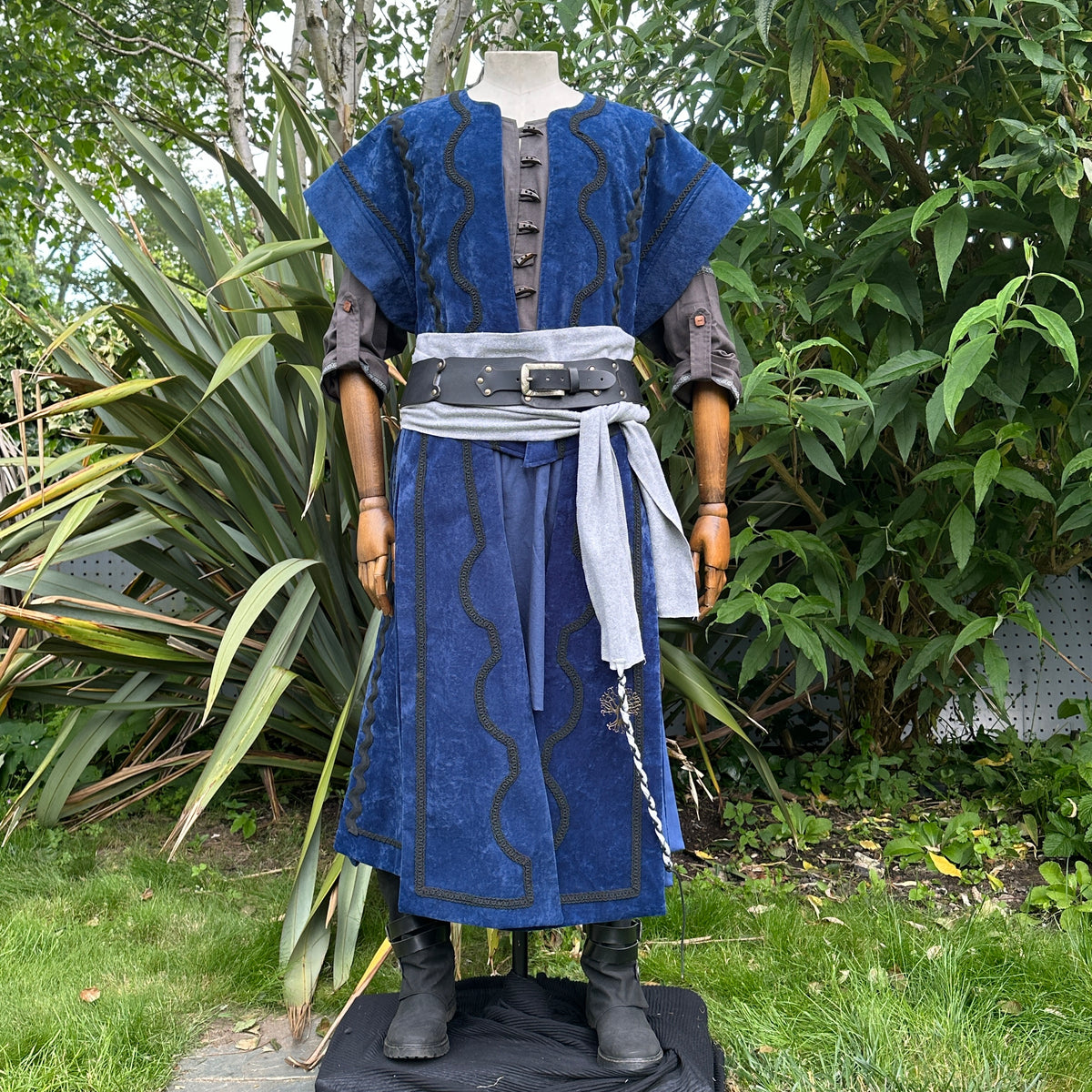 Blue velvet LARP waistcoat, tunic, and grey sash with black belt, front view.