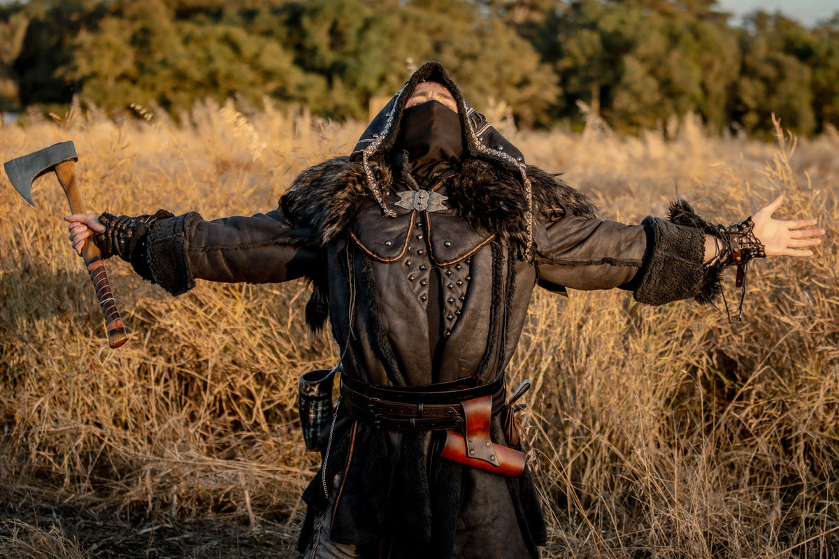 Dark medieval LARP warrior set: black jacket, hood, vambraces, leather look.
