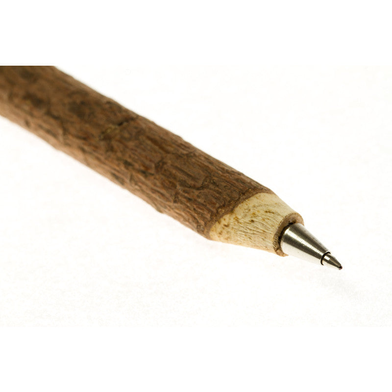Close-up of twig pen tip for medieval LARP, showing wood texture detail.