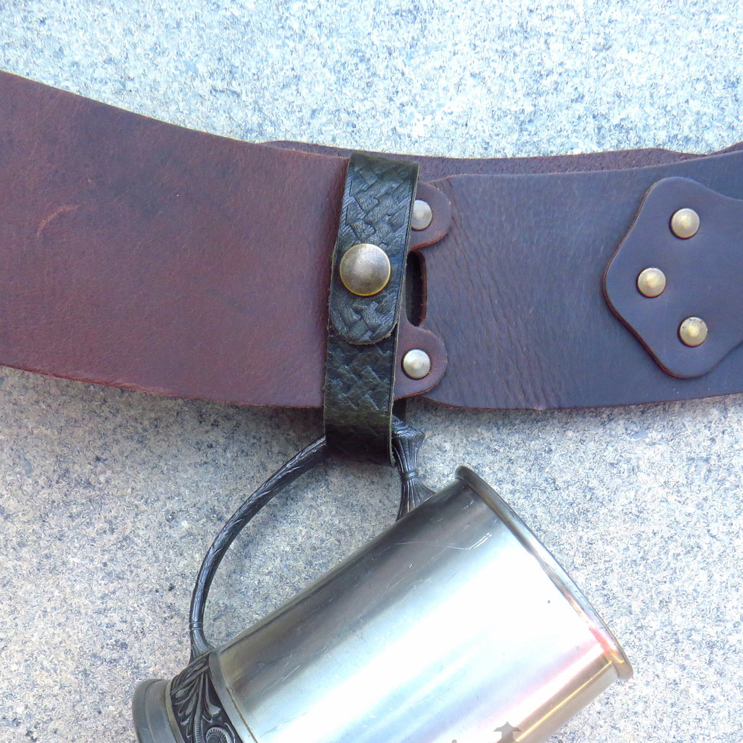 Close view of the Celtic knot tankard loop fastened around a belt