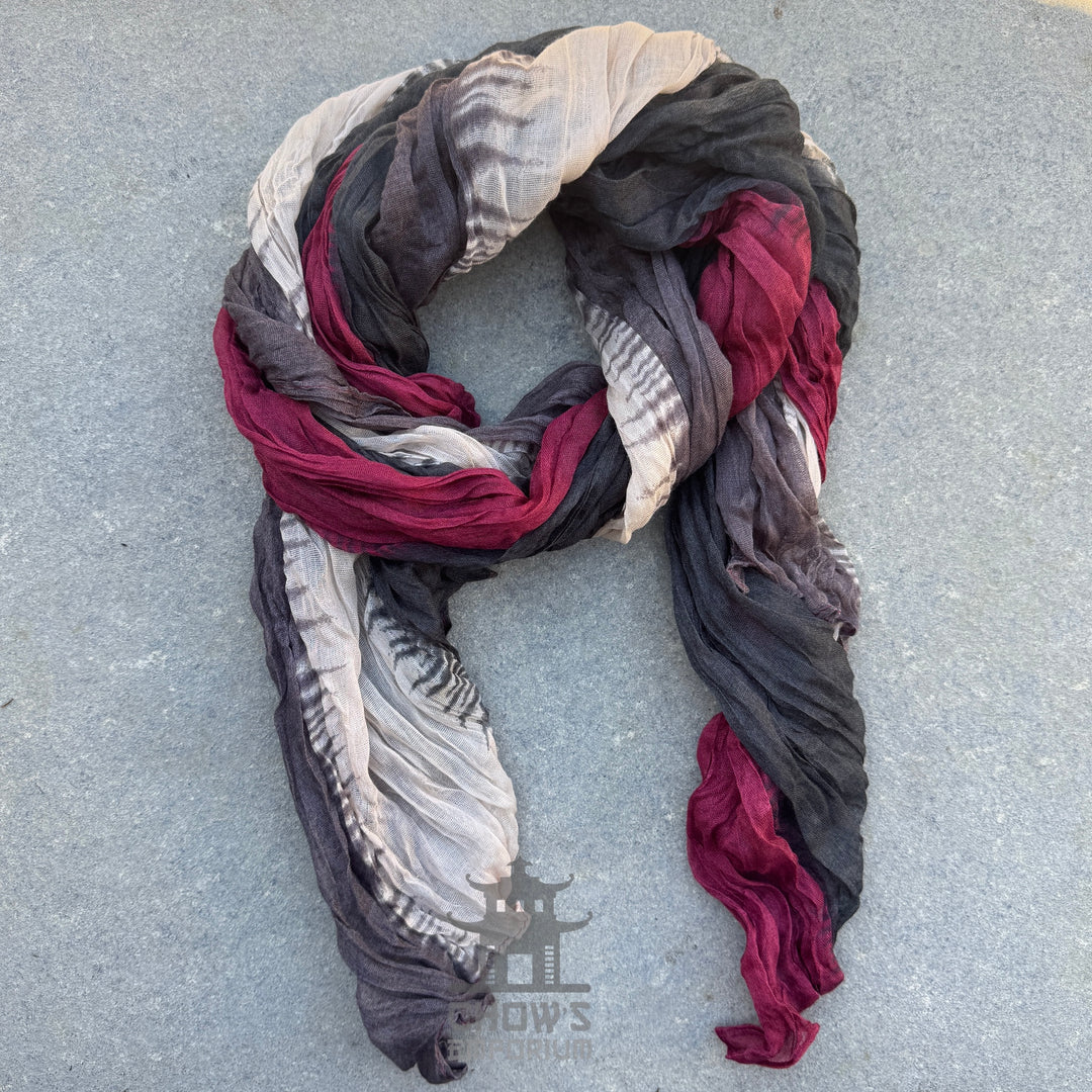 Cinder pirate sash tied and draped, grey, cream and crimson viscose