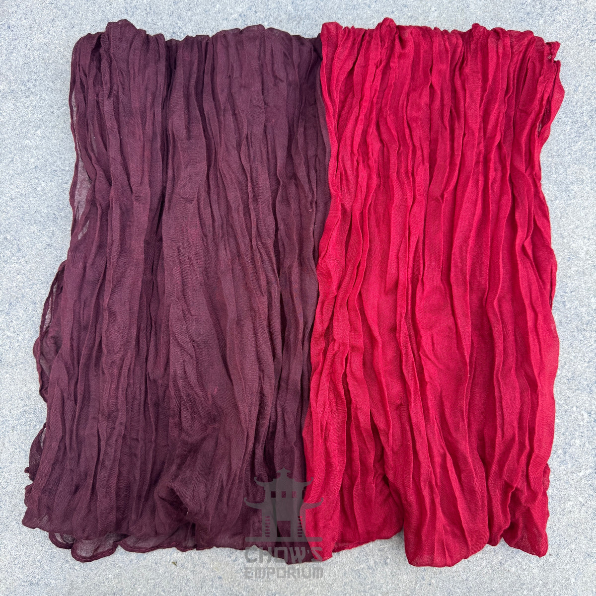 Folded Crimson pirate sash showing crimson to maroon two-tone