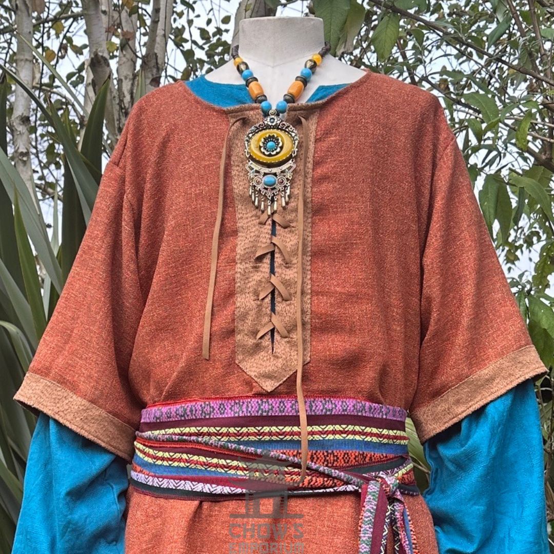 Orange and brown medieval tunic with blue sleeves and a woven belt for LARP.