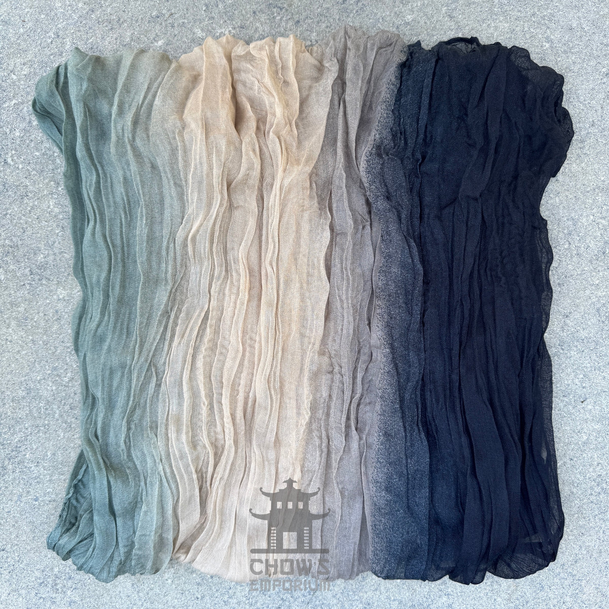 Folded Dune pirate sash showing cream to black gradient