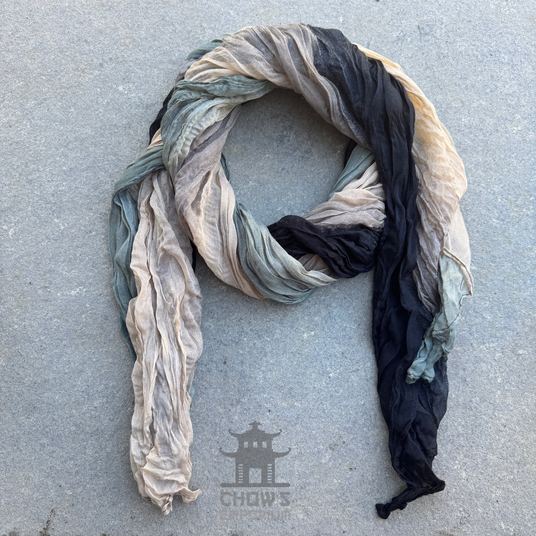 Dune sash in cream and black with grey-green tones, twisted and laid flat, an accent piece in the Phantom Duke noble outfit set