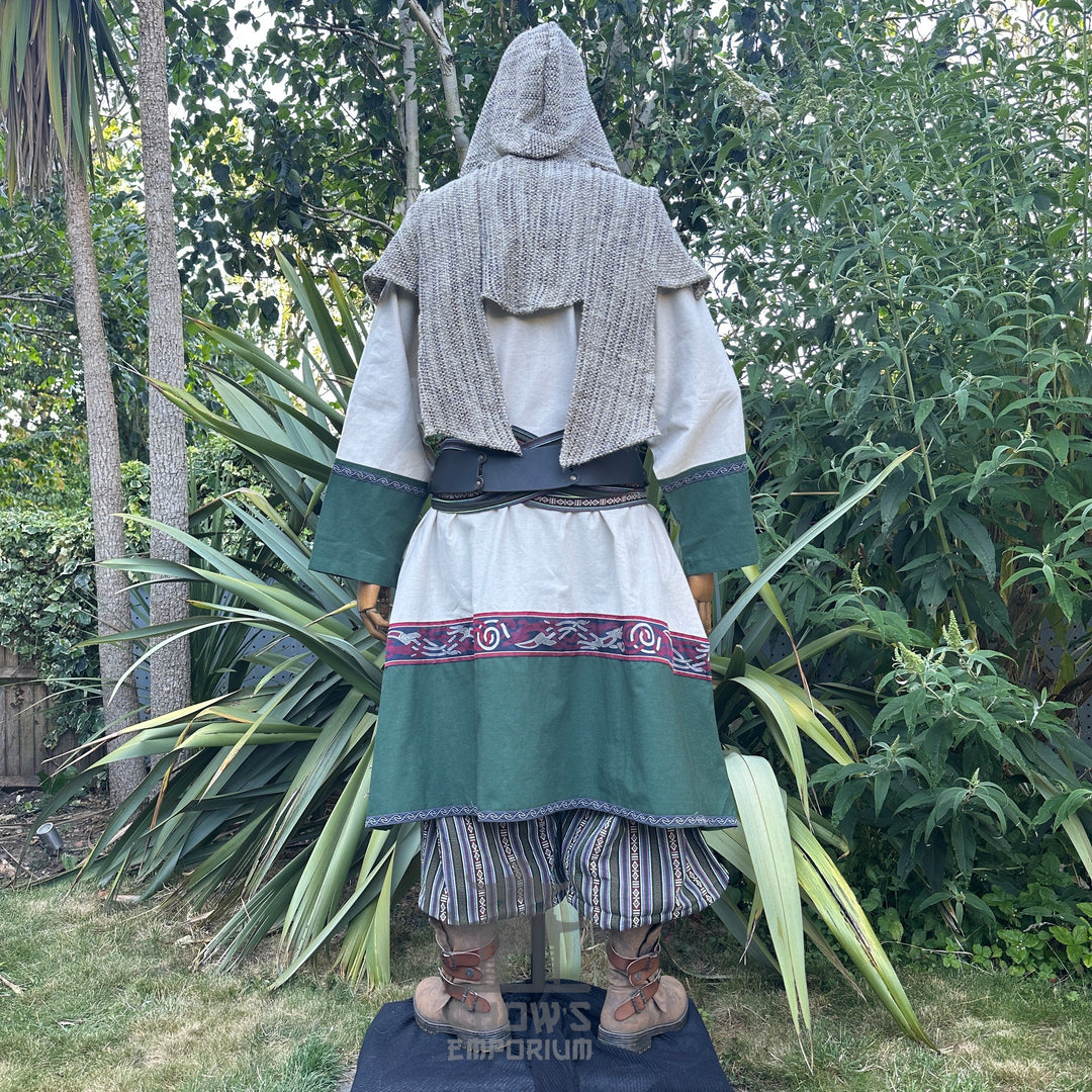 Back view of LARP outfit with hood, green trim, and patterned sash.