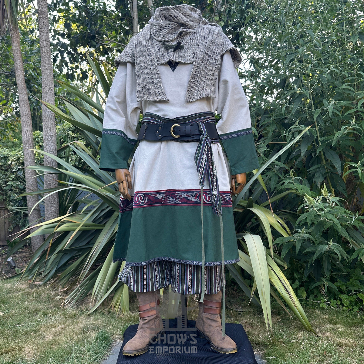 Medieval LARP outfit with tunic, belt, and scarf, displayed.