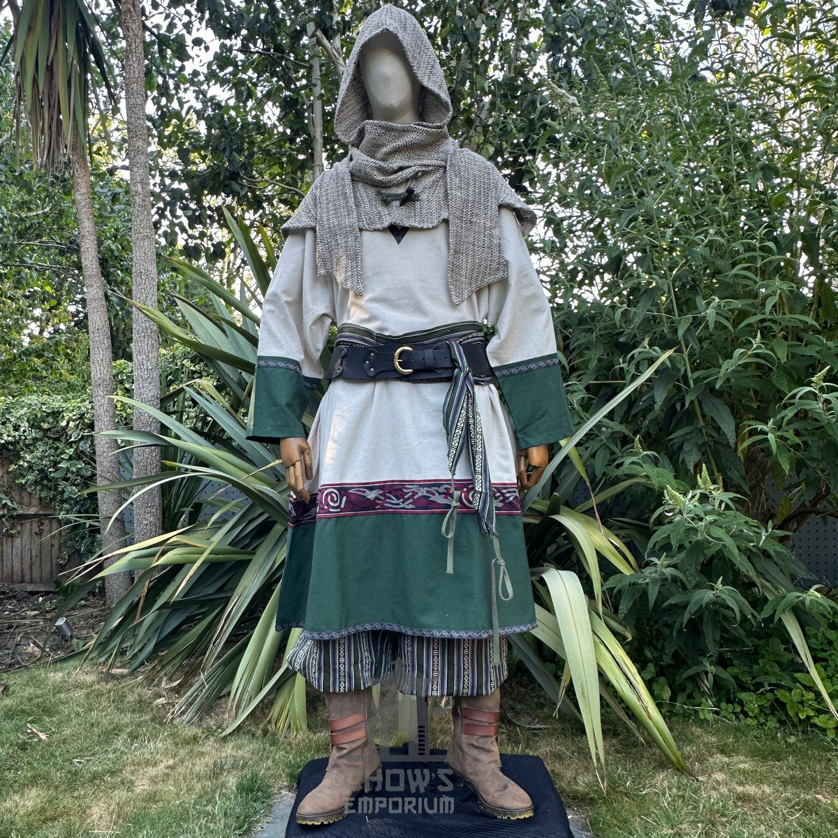 Medieval LARP attire with hood, tunic, belt, and layered trousers.