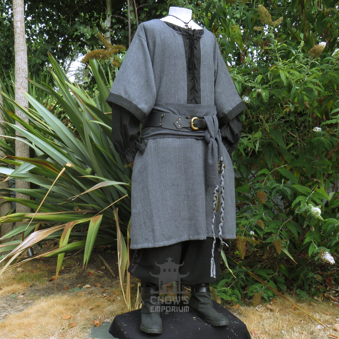 Grey and black woven medieval tunic, side view showing the black centre panel, worn with a sash. Sash sold separately.
