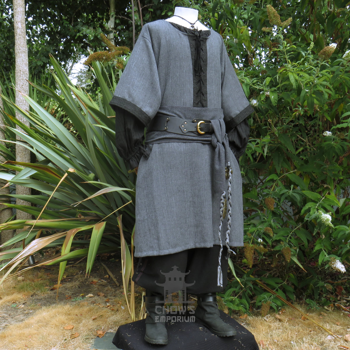 Grey and black woven medieval tunic, side view showing the black centre panel, worn with a sash. Sash sold separately.