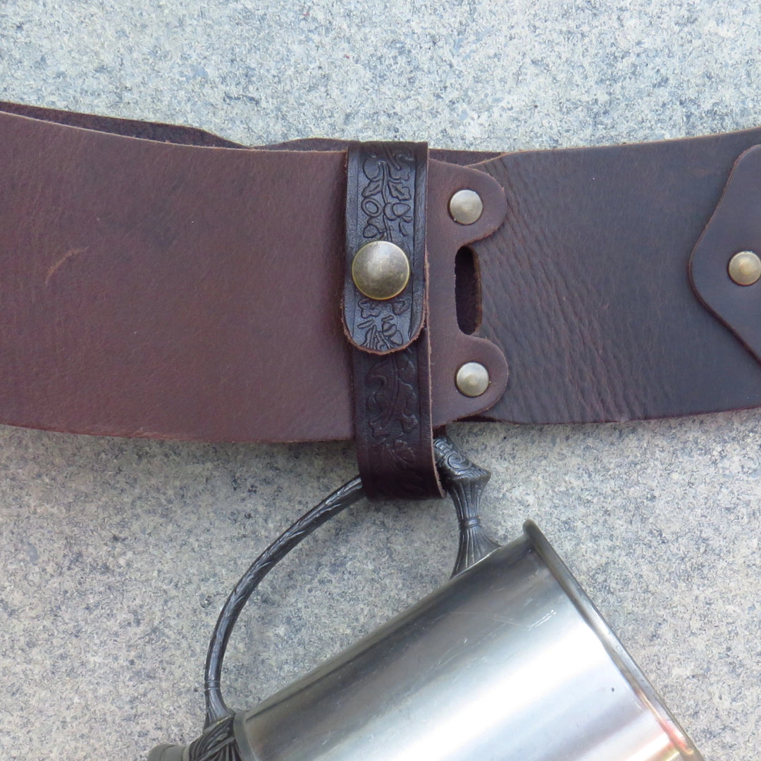 Side view of the brown leather tankard loop holding a tankard on a belt