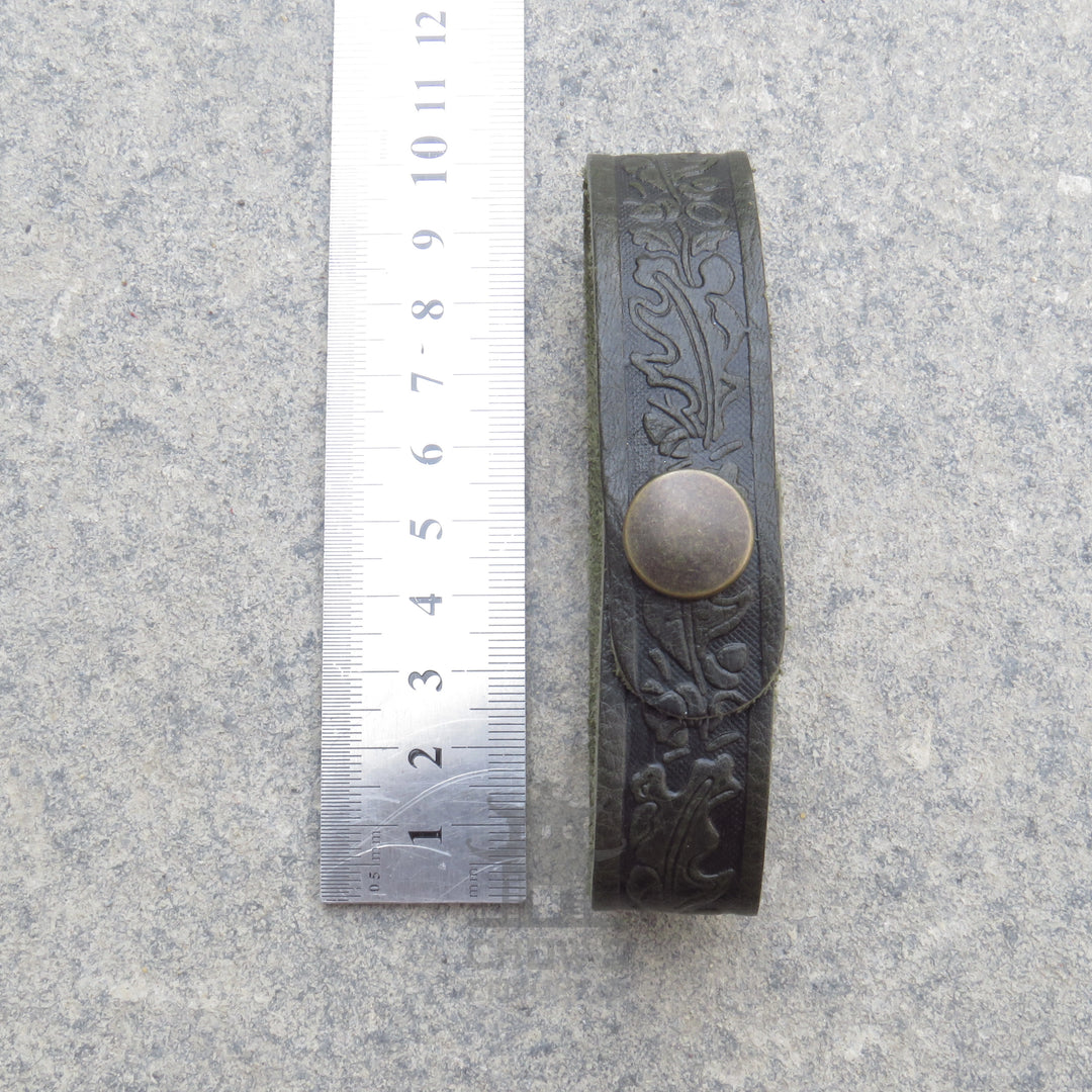 Leather tankard loop measured against a ruler at 25.5cm long