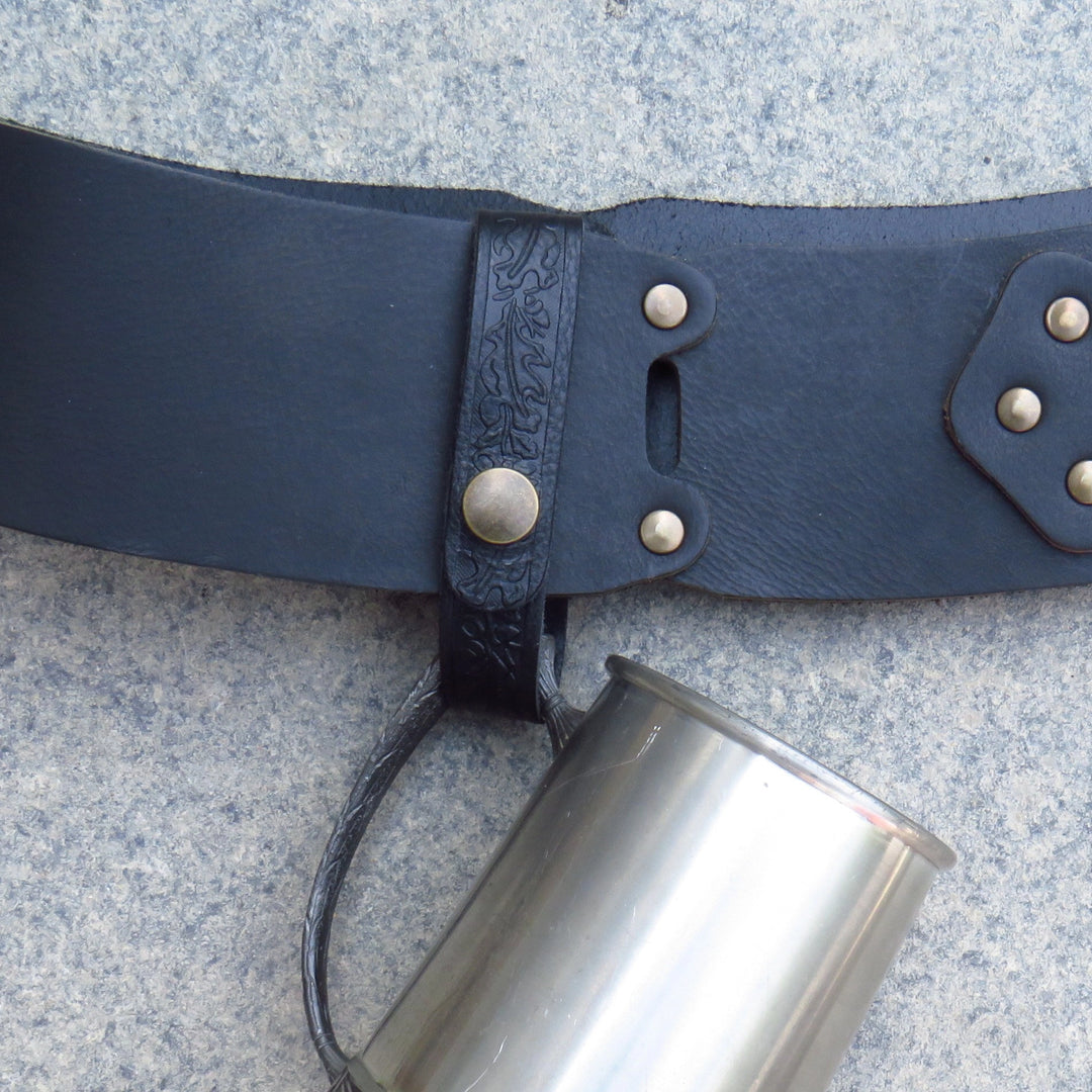 Navy leather tankard loop on a belt carrying a tankard