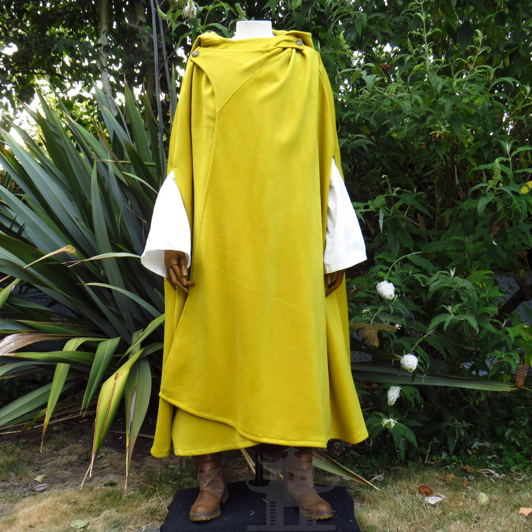 Mustard wool cloak worn over a white shirt, hood down
