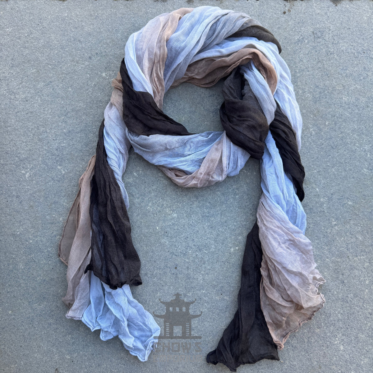Pebble pirate sash tied and draped, grey, white and brown viscose
