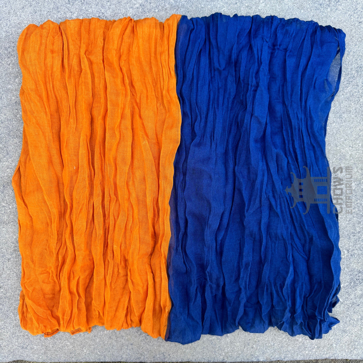 Folded Portal pirate sash showing navy blue and orange two-tone
