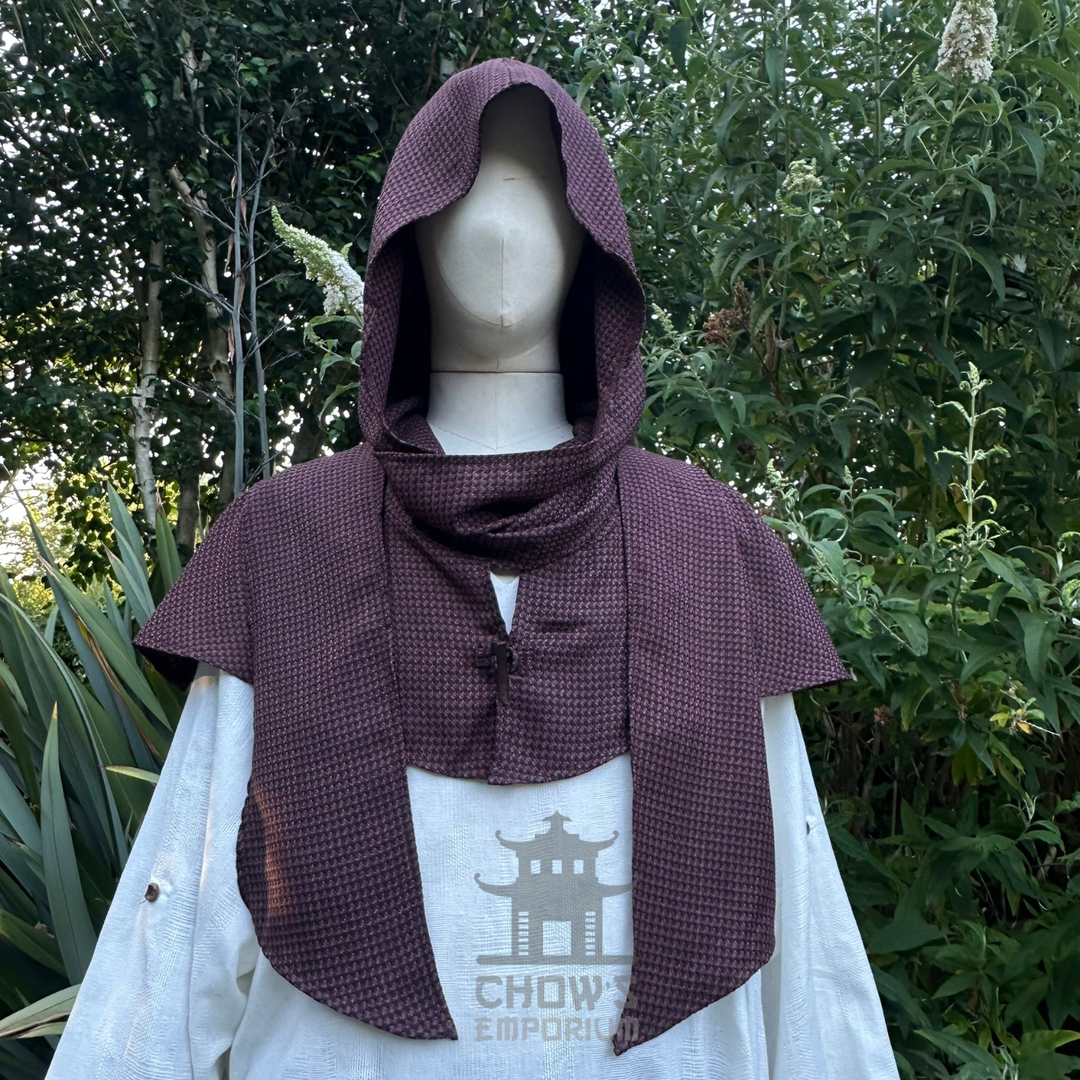 Brown medieval scarf hood worn up over the head, wraparound ends draped