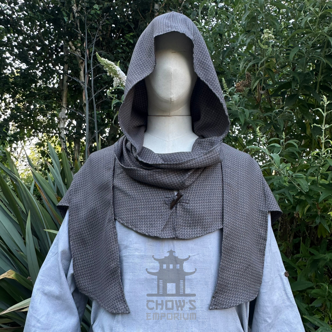 Grey medieval scarf hood worn up over the head, wraparound ends draped