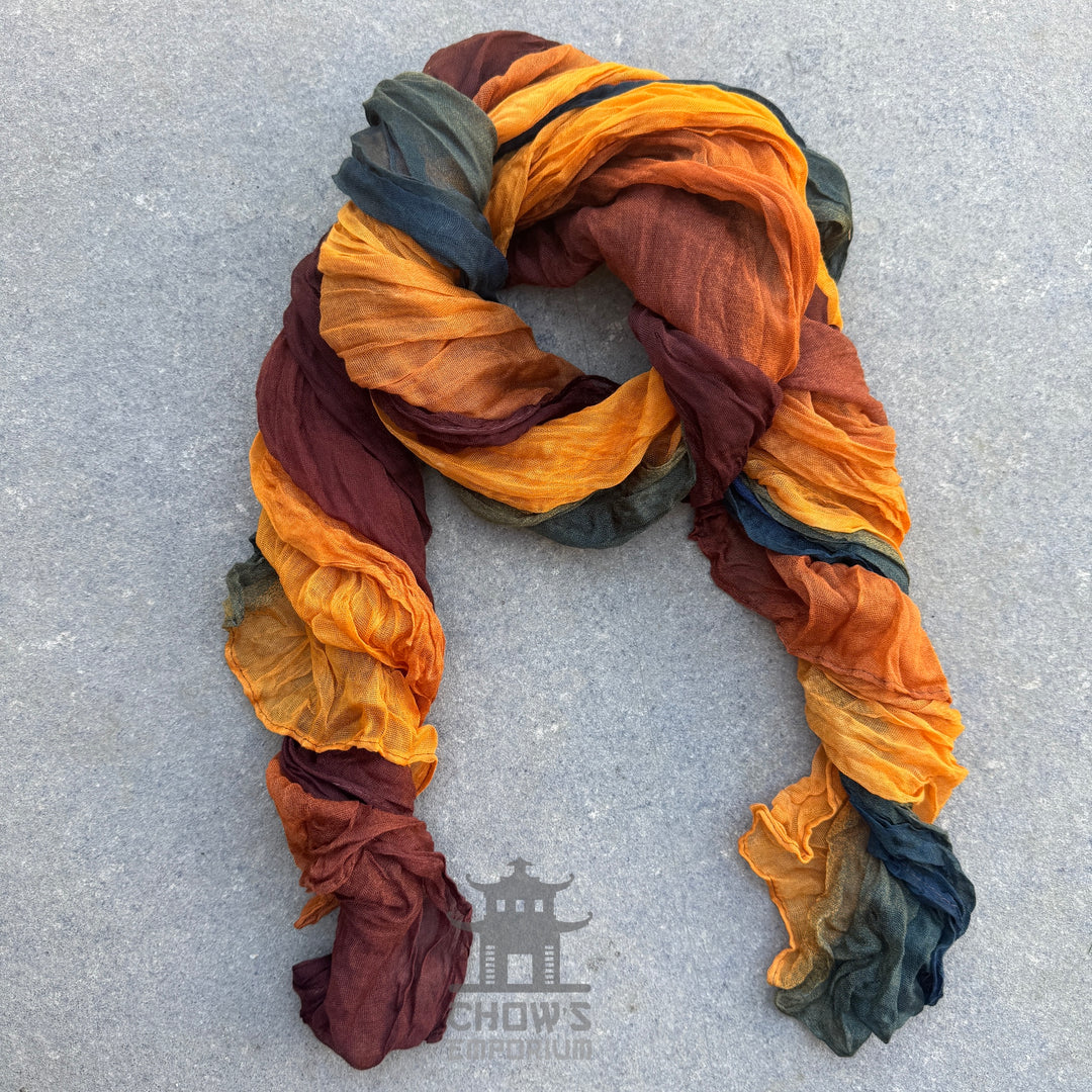 Spice pirate sash tied and draped, rust, orange and teal viscose

