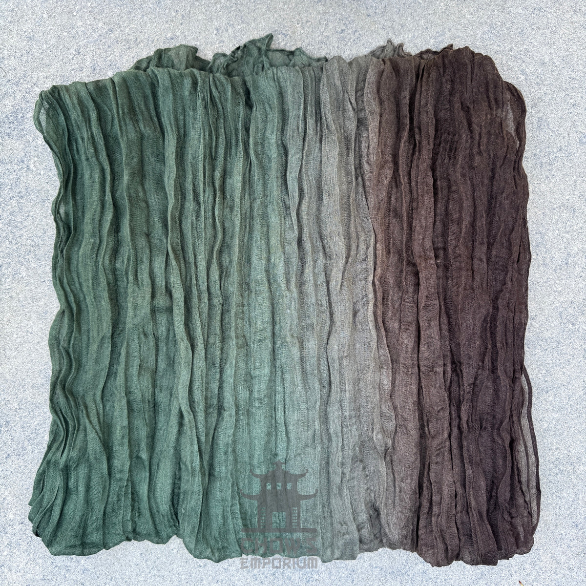 Folded Thorn pirate sash showing brown to green gradient