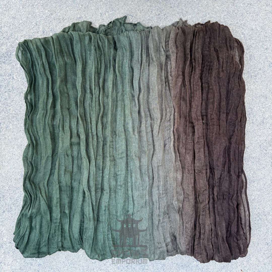 Folded Thorn pirate sash showing brown to green gradient