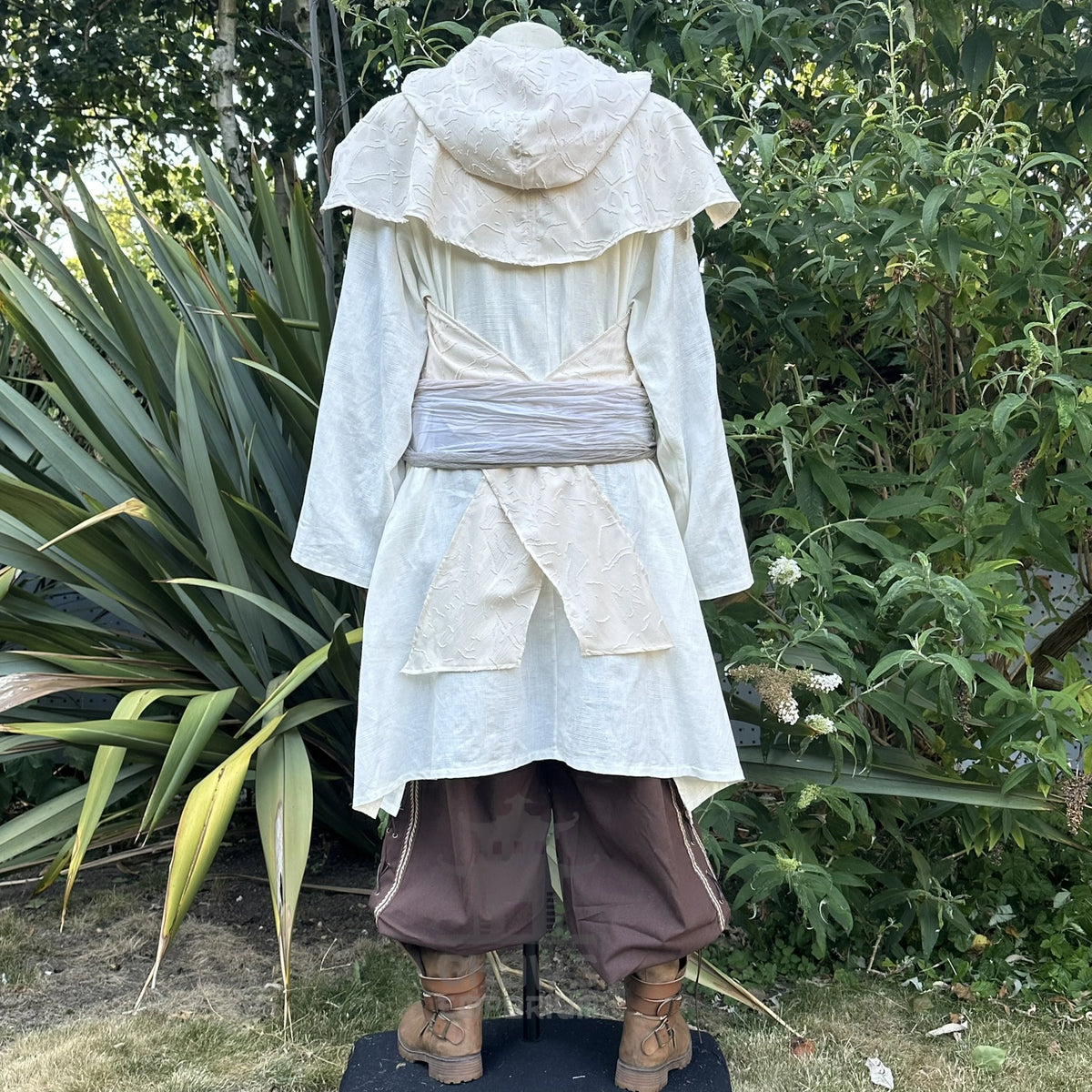Back of the white medieval scarf hood showing the wraparound ends