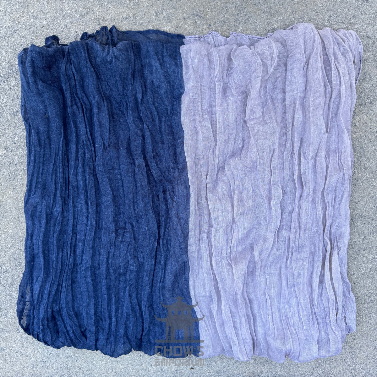 Folded Wisp pirate sash showing navy and grey tones