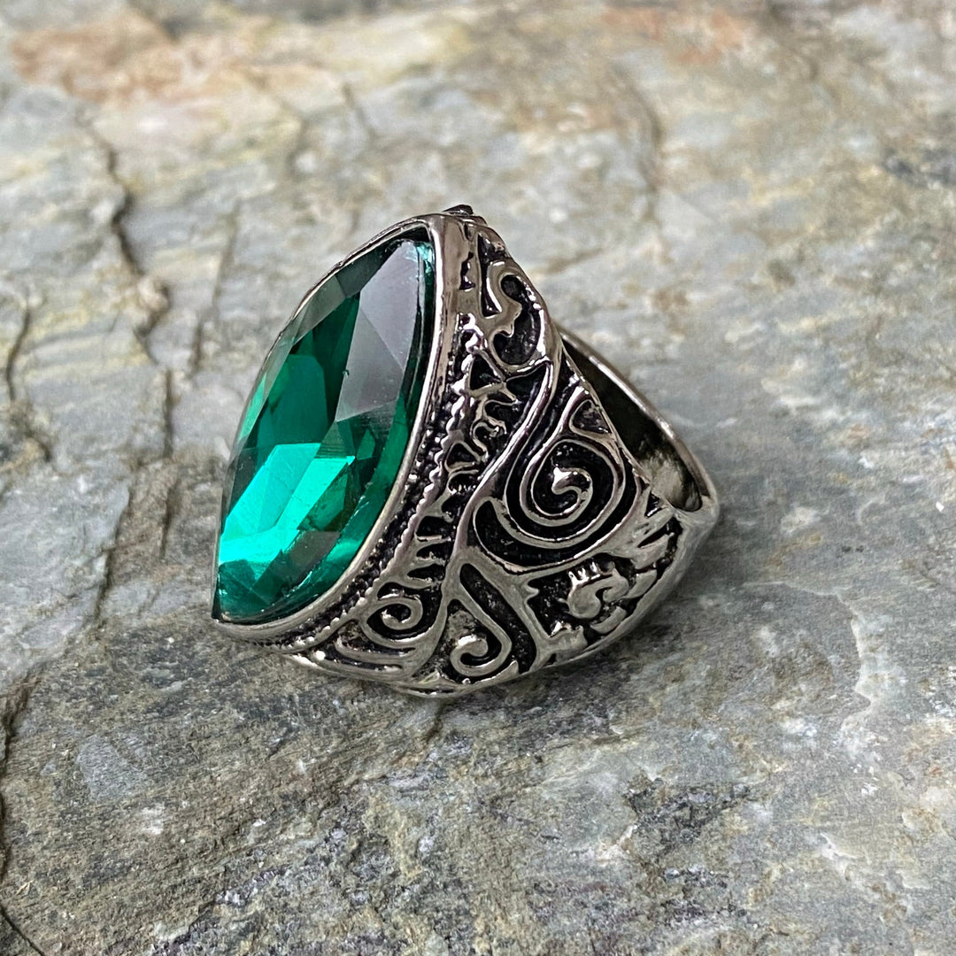 Ornate green gemstone ring with intricate medieval setting for LARP.