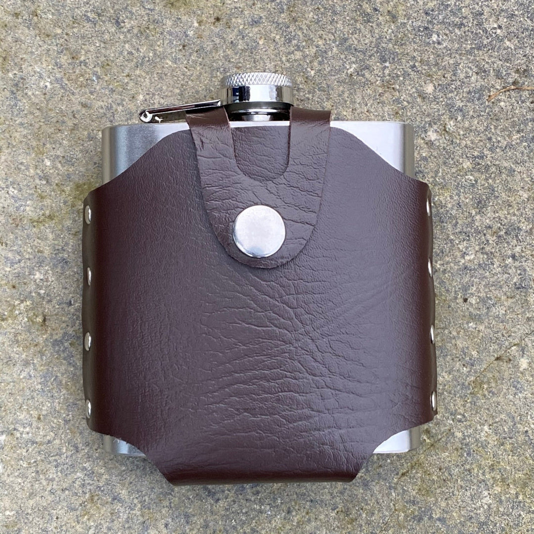 Brown leather hip flask with belt holder, rivets visible, for medieval LARP.