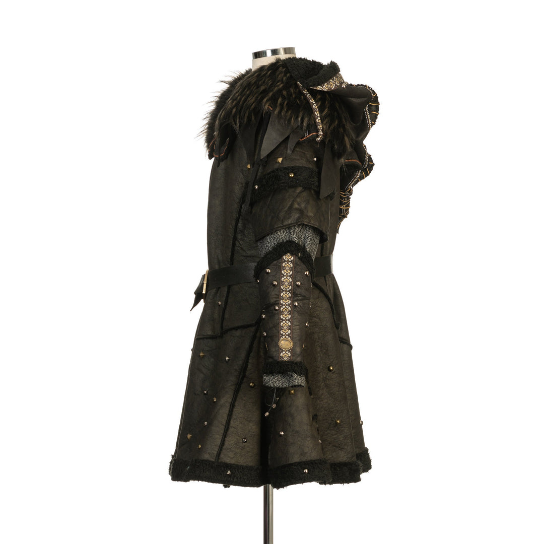 Barbarian LARP armour set, black faux leather with ornate details, side view.