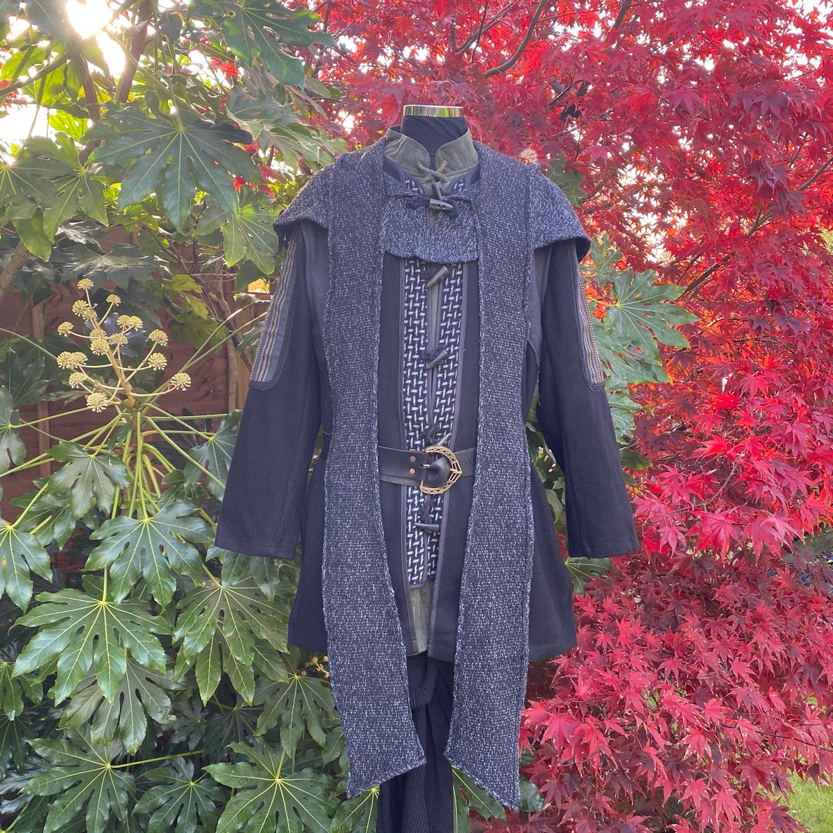 Medieval LARP tunic with grey scarf hood, front view.