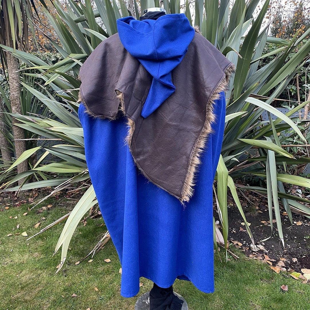 Royal blue wool medieval cloak with brown mantle, back view.
