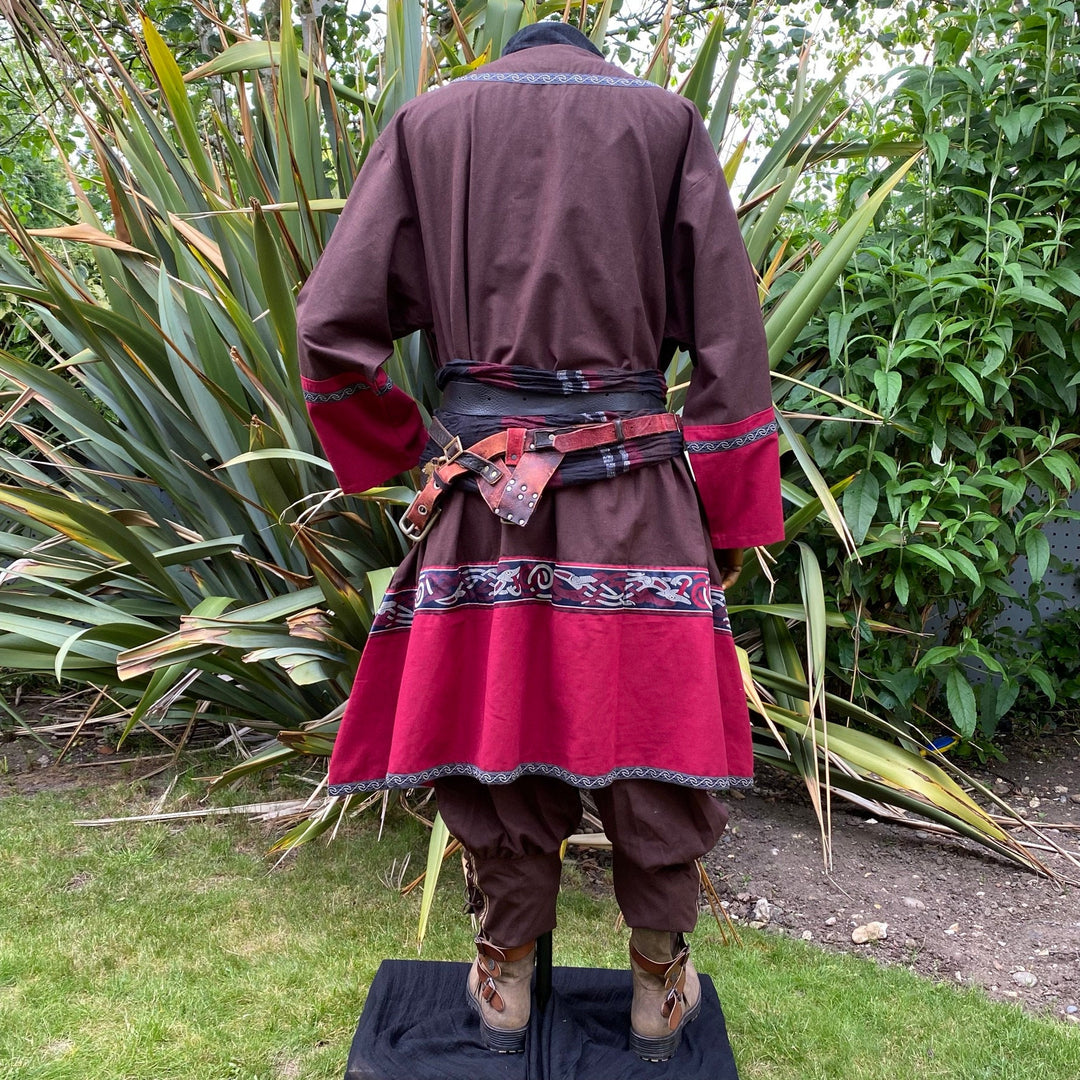 Back view of brown and red medieval LARP outfit with detailed trim.