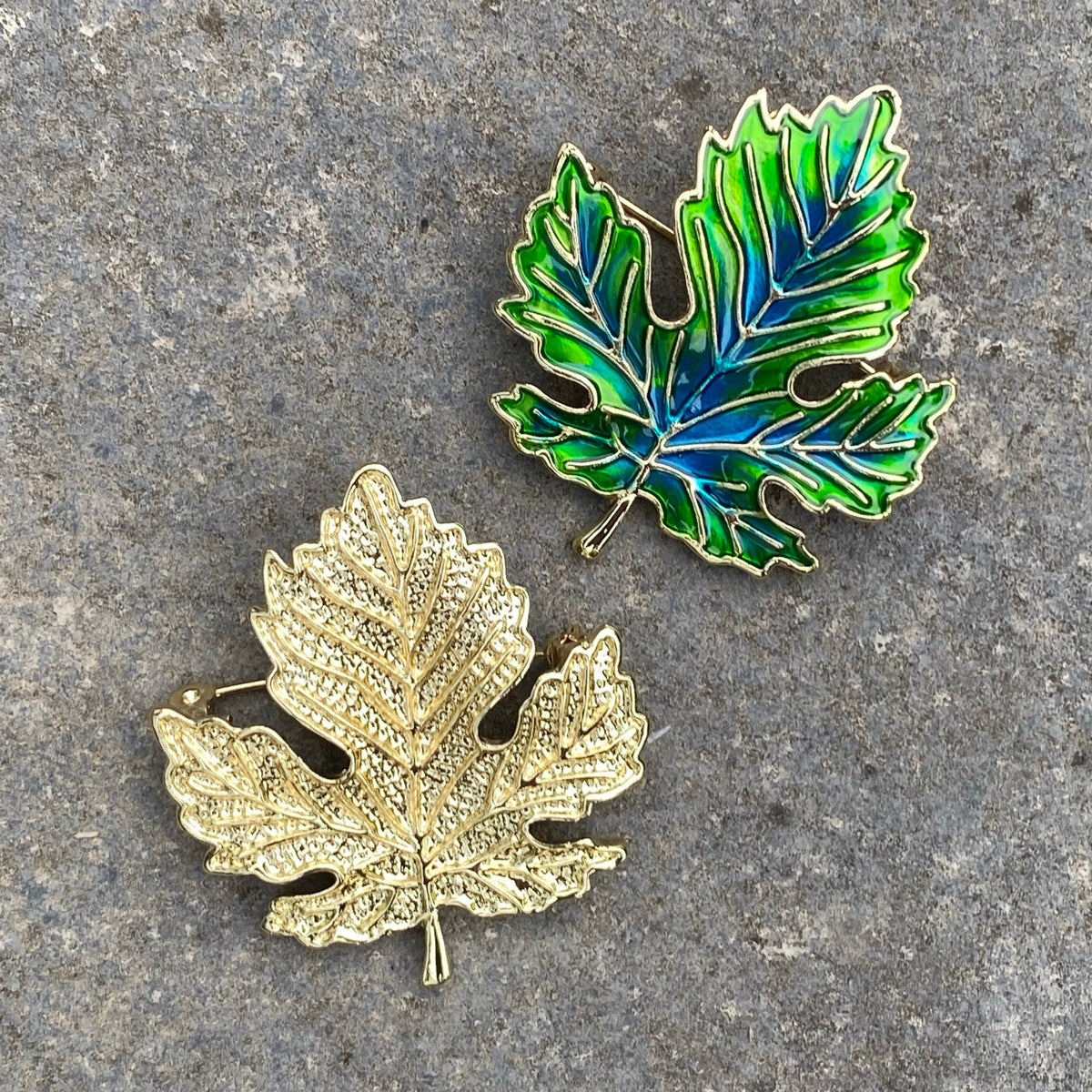 Elven leaf brooches on stone, gold and green design for LARP.