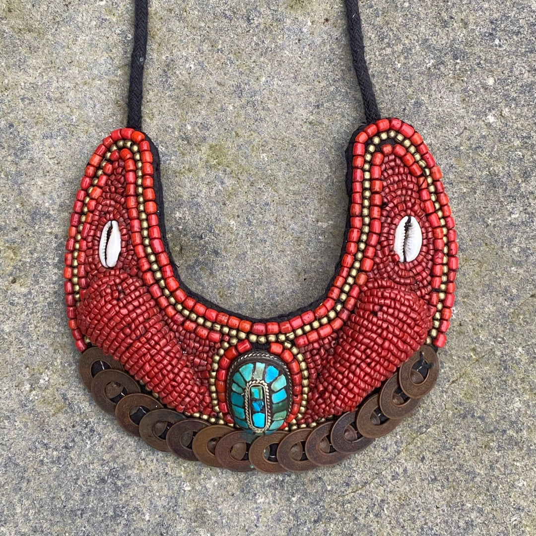 Red Maasai bead necklace with cowrie shells for LARP medieval attire.