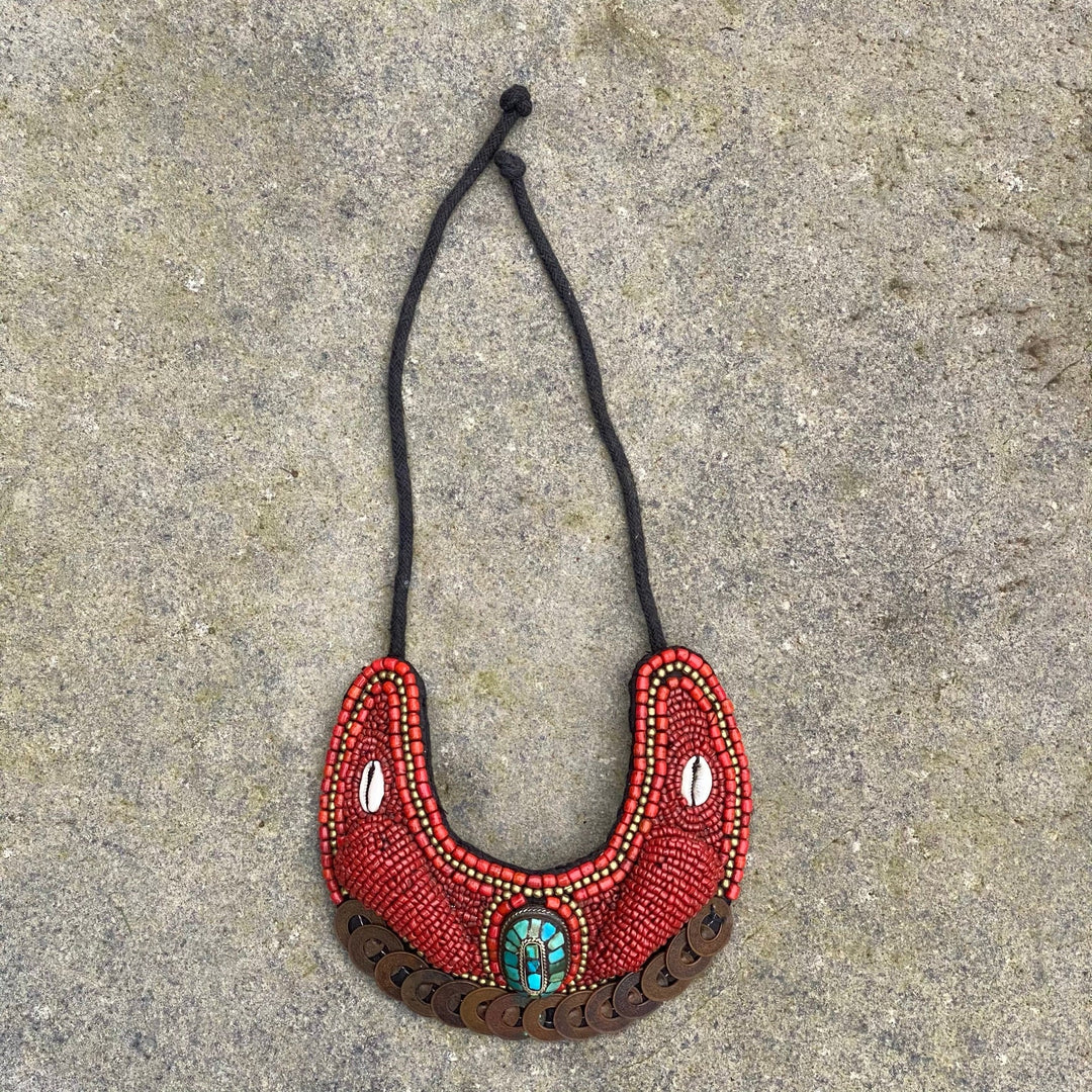 Horseshoe-shaped Maasai necklace on stone for LARP.