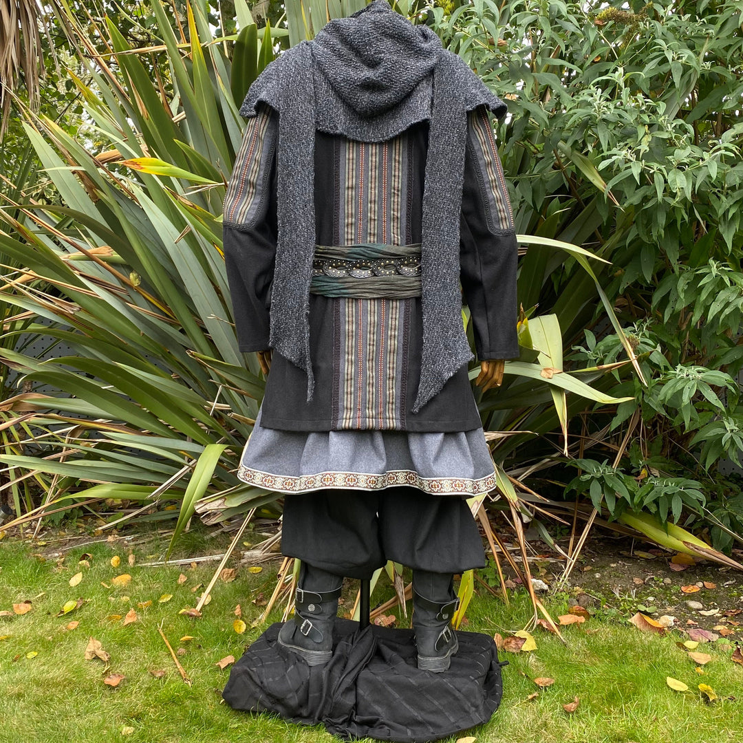 Rear view of LARP ranger outfit; striped jacket, hood, ornate trim pants.
