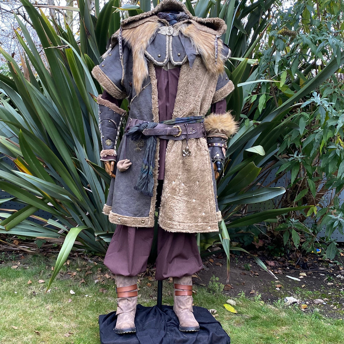 Fleece-lined barbarian LARP armor with fur trim, front.