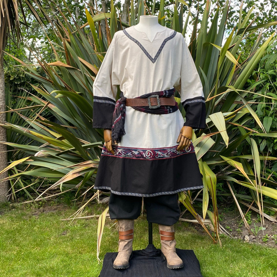 Medieval LARP attire with detailed belt and boots on.