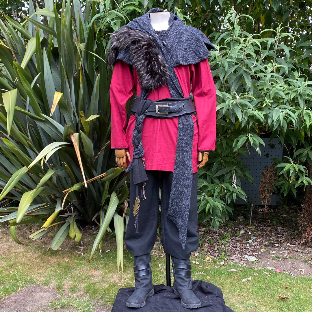 Medieval LARP attire front view: red tunic, black pants, fur mantle.