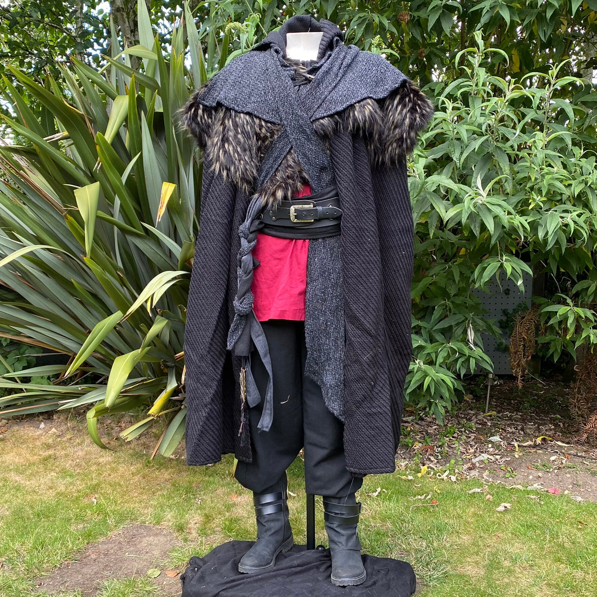 Mannequin in LARP costume with draped cloak and braided accent.