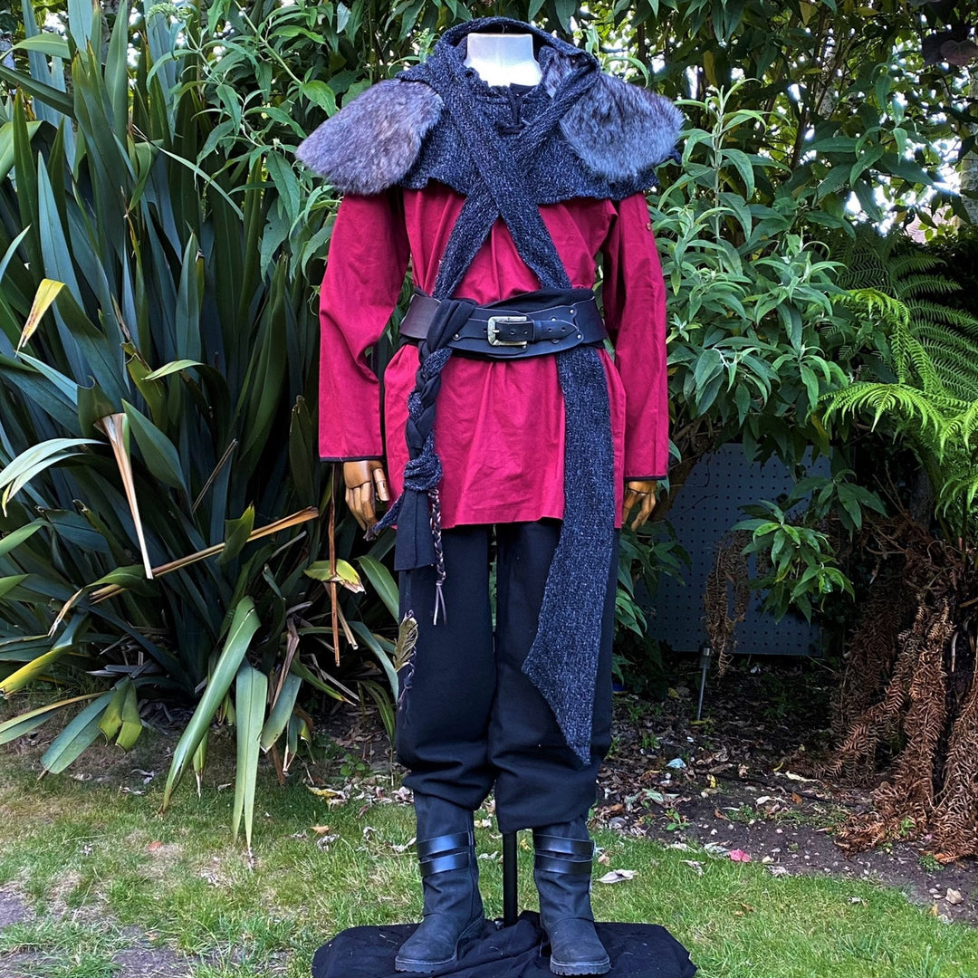Medieval LARP costume with red tunic, black pants, grey fur mantle.