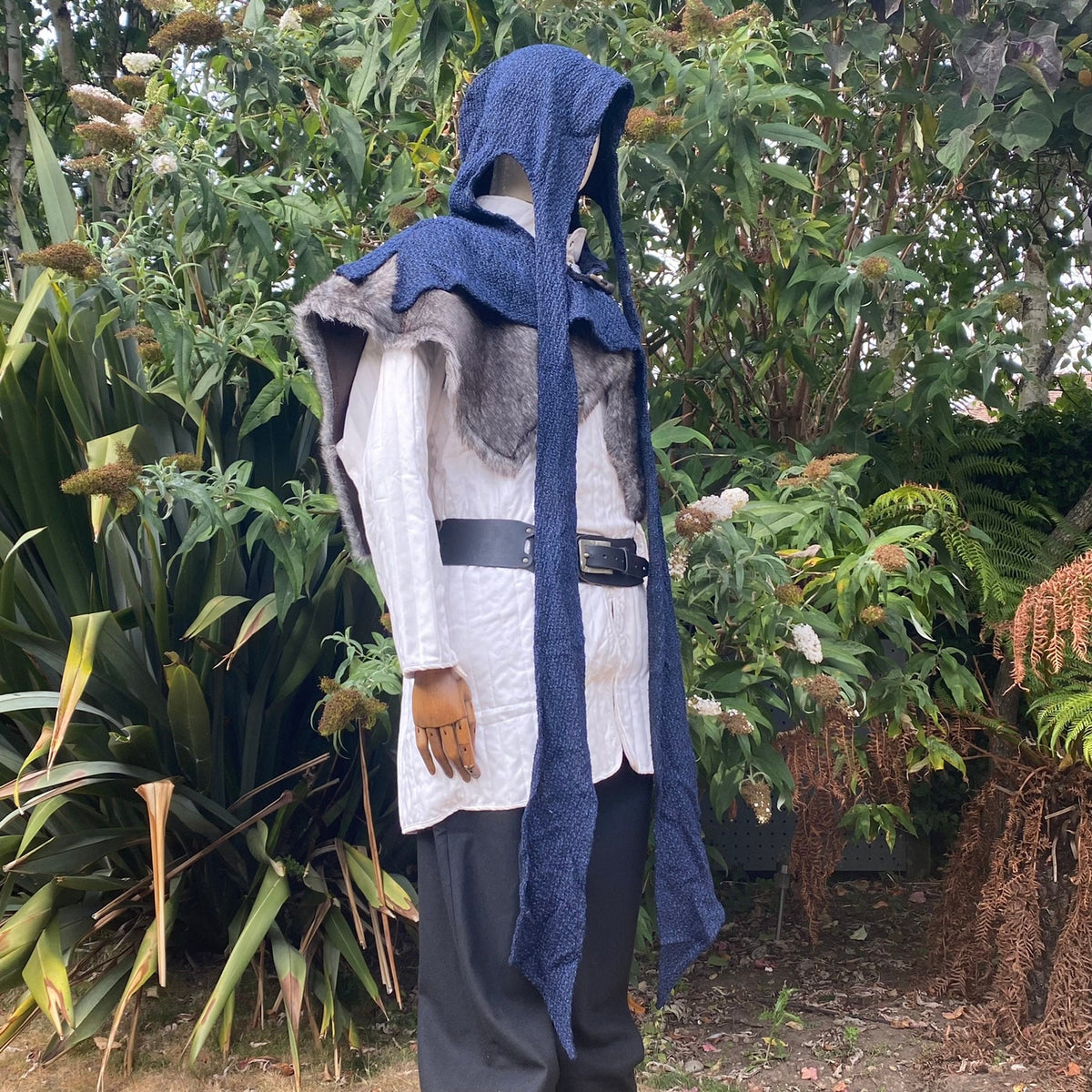 Side view of LARP hood with long tails and faux fur cape.