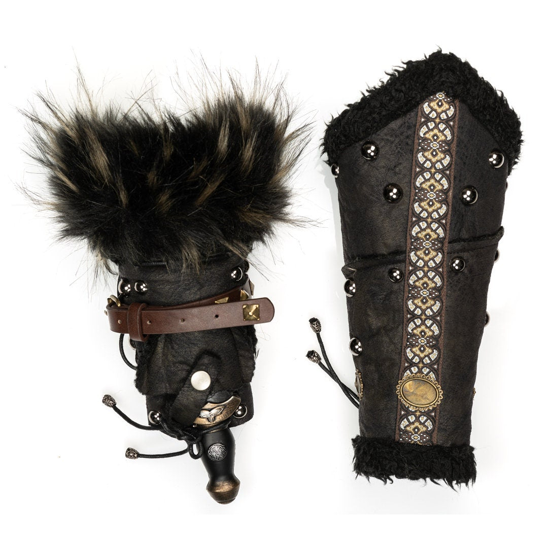 Black medieval LARP vambrace set with fur trim and intricate designs.