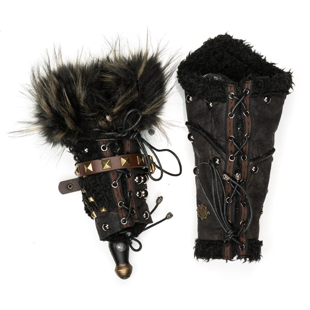 Ornate medieval vambrace with faux fur trim, studs, and laced details.