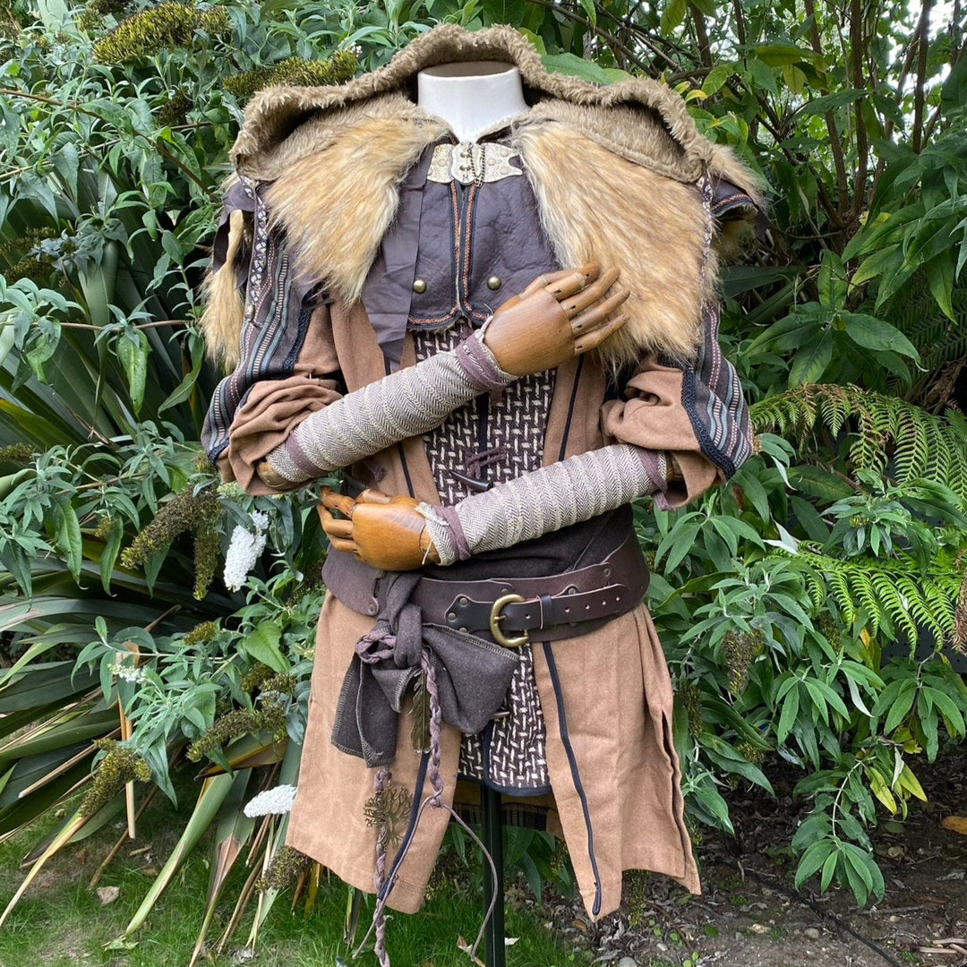 Set of Medieval LARPing Arm Wraps. They are coloured Light Brown and made out of a Herringbone.